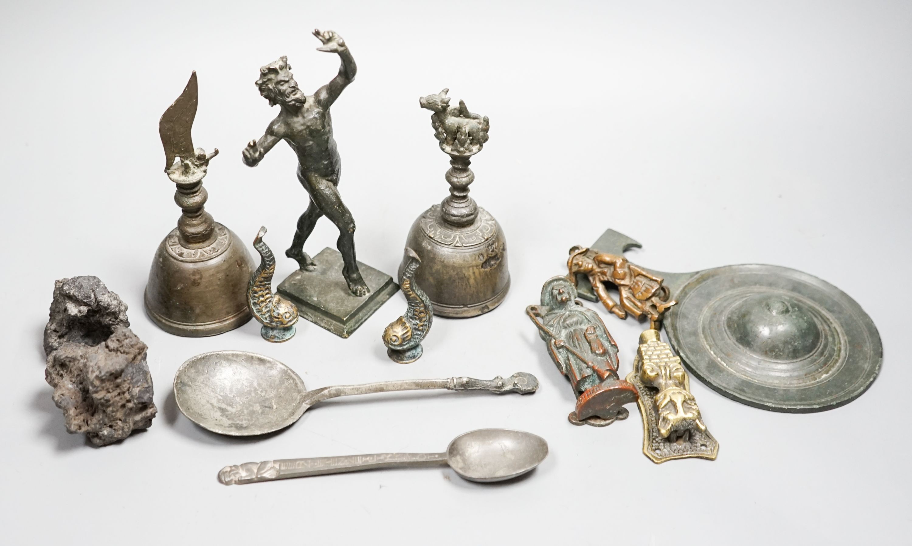 A small quantity of decorative metalware, including two bronze table bells, a bronze faun, 17cm, pewter spoons, etc.